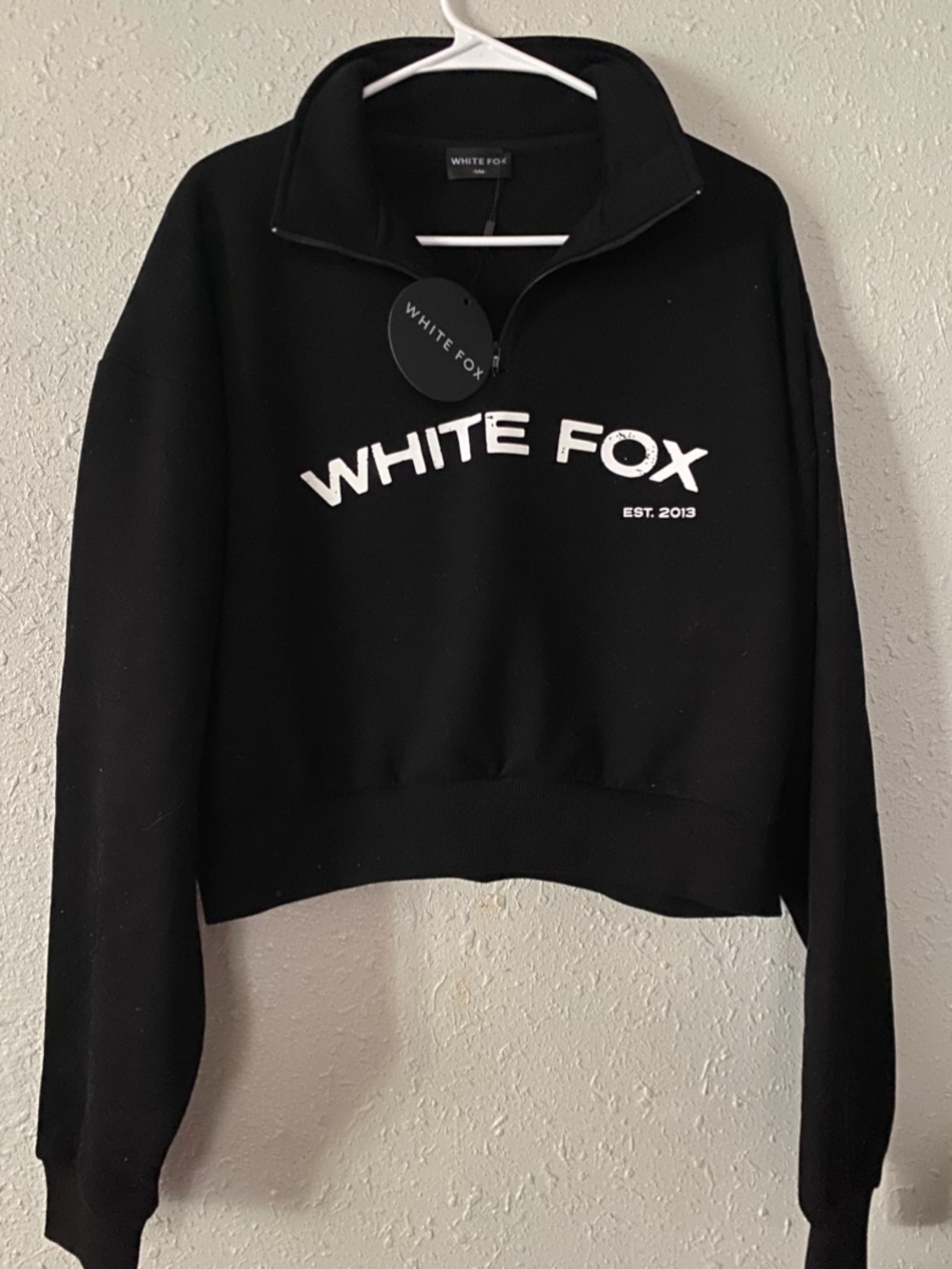 White Fox Boutique Black Cropped Quarter-Zip Sweatshirt with White Logo